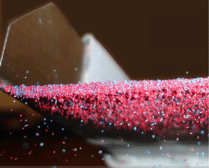 Spontaneous Separation of Charged Grains image